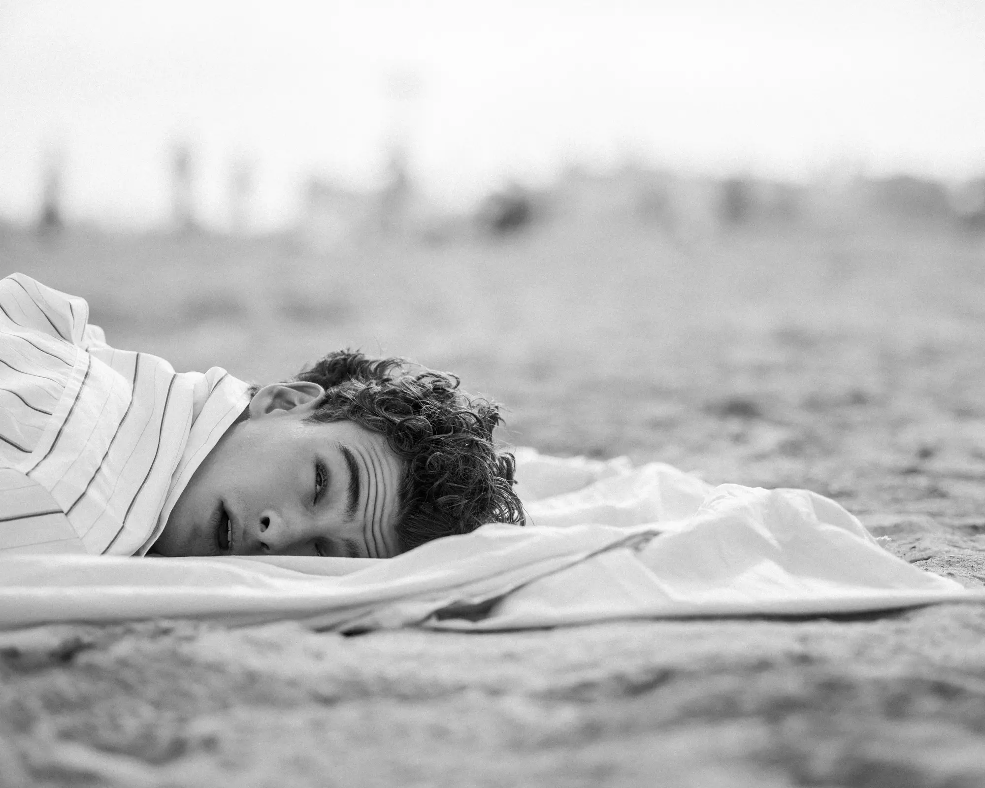 Sleeping On the Beach | V MAN