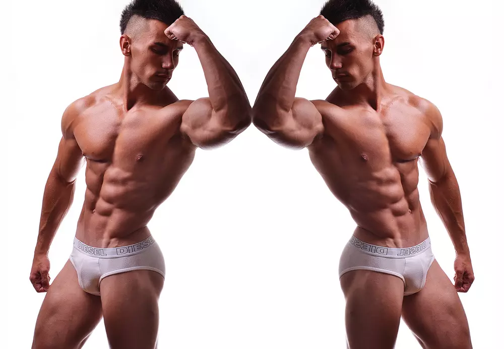 Ang Bosnian fitness male model na si Kristian Šaula ay nagpo-pose at inibaluktot ang kanyang fit toned body sa harap ng camera ni Mladen Blagojevic.