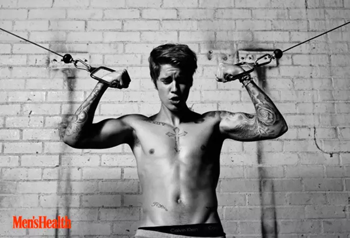 Justin Bieber o loʻo ufiufi le lomiga lata mai o Men's Health magazine, na pueina e Peter Hapak.